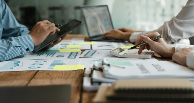 Business People Analyzing Statistics Business Documents, Financial Concept